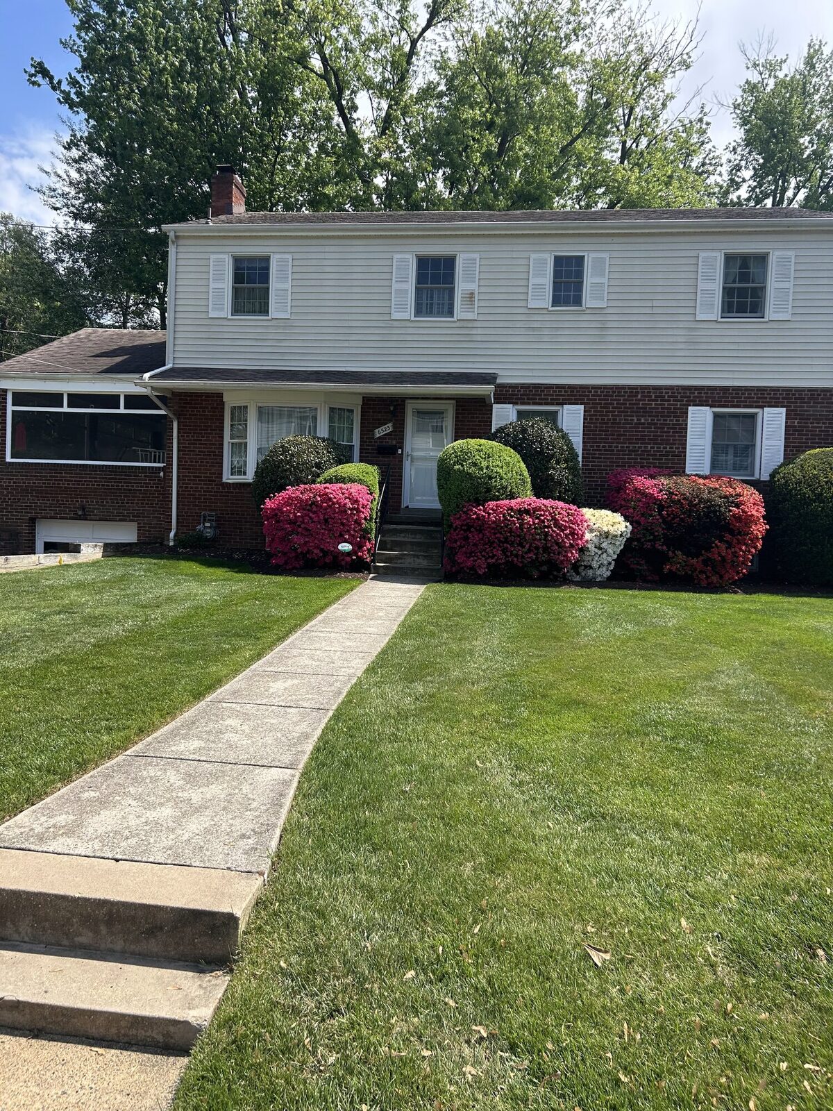 Walkway before — dingy concrete panels